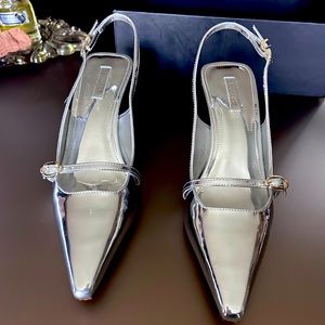 Silver metallic, slingbacks.